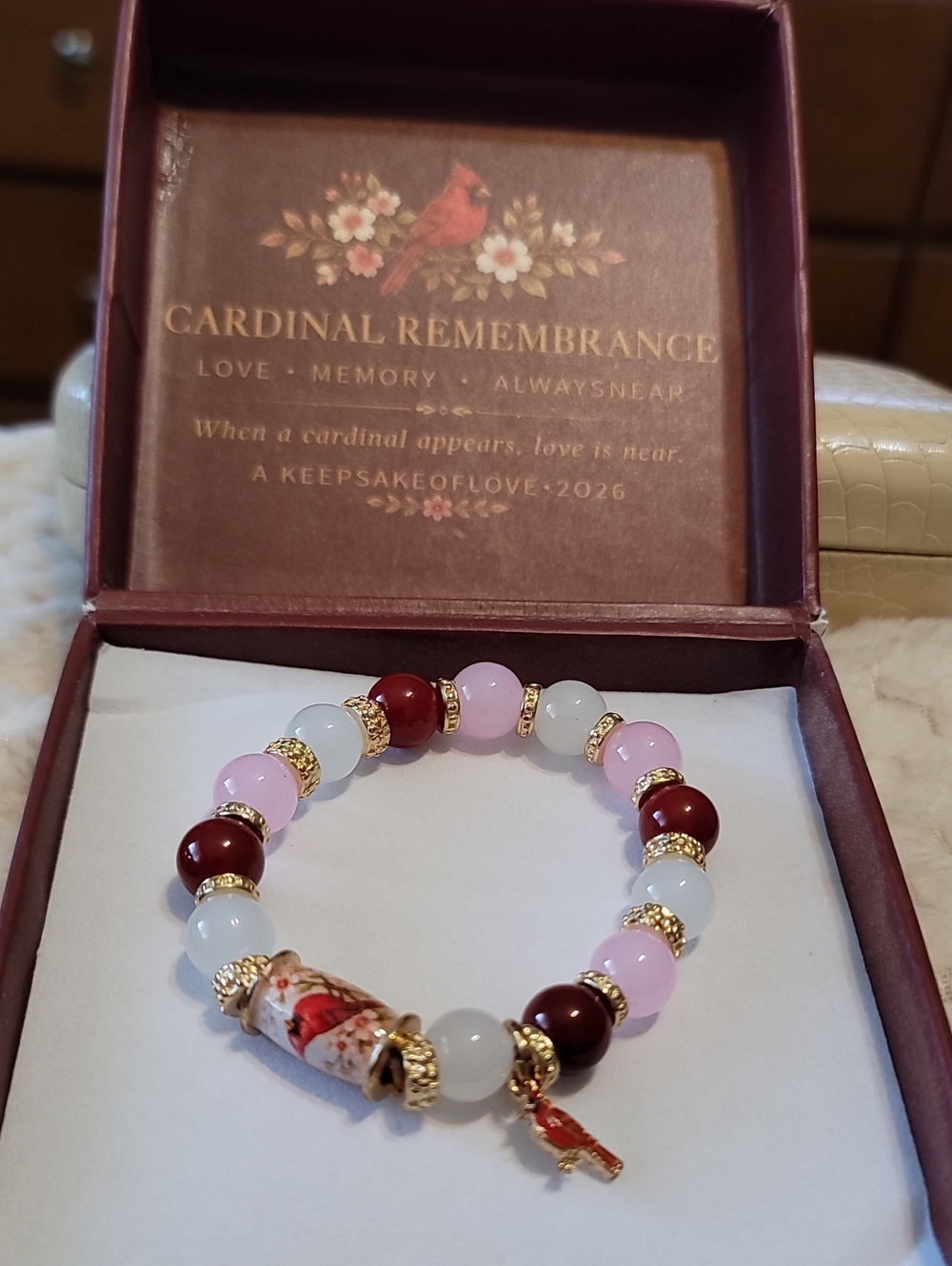 Cardinal, Light Pink And Red Bead Stretch Bracelet with Gold Accents  With Box